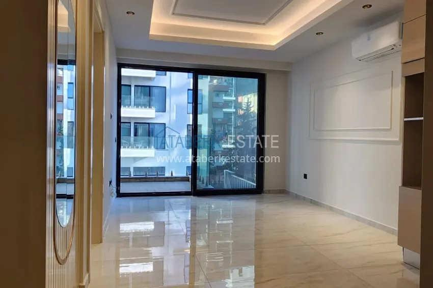 Приобрести Квартира с чистовой отделкой на первой береговой линии - Алания, район Махмутлар 5 