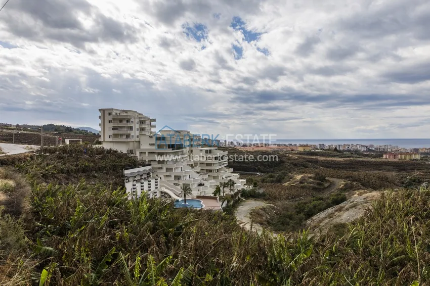 Великолепные террасные апартаменты с мебелью и видом на море в Алании, район Махмутлар 4 