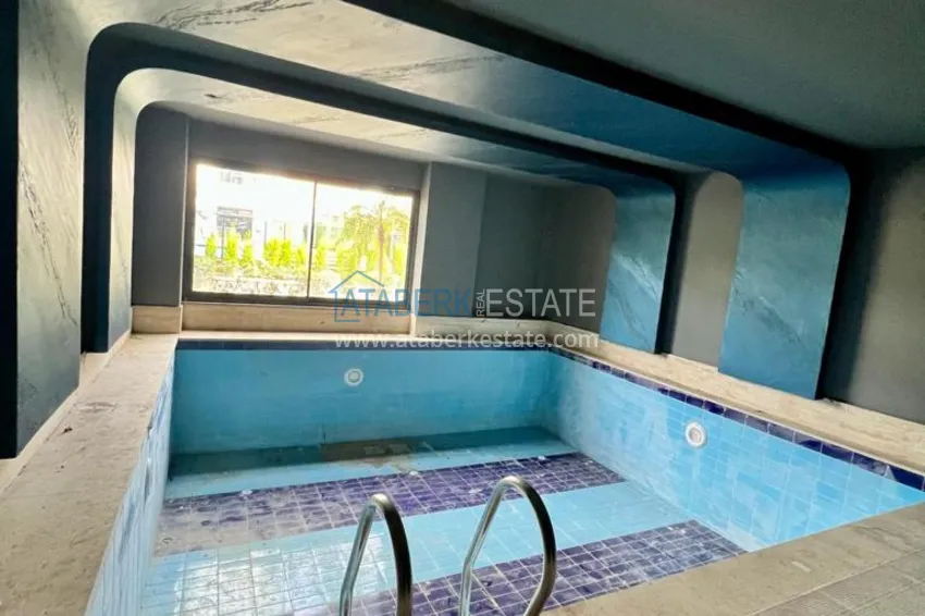 Новостройки Алании. Двухкомнатная квартира с чистовой отделкой в районе Махмутлар 4