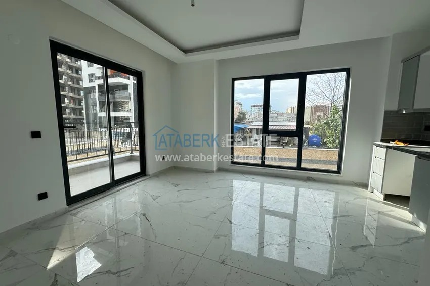 Приобрести Новостройки Алании. Двухкомнатная квартира с чистовой отделкой в районе Махмутлар 4