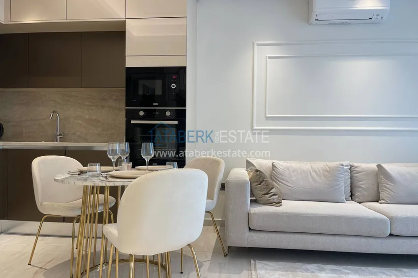 Приобрести Квартира под ключ с видом на море на первой береговой линии, в Алании, район Махмутлар 4 