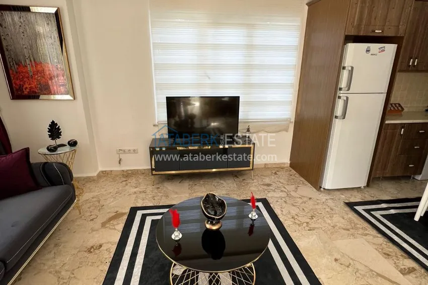 Приобрести Трехкомнатная квартира с мебелью в Алании, район Махмутлар 5 