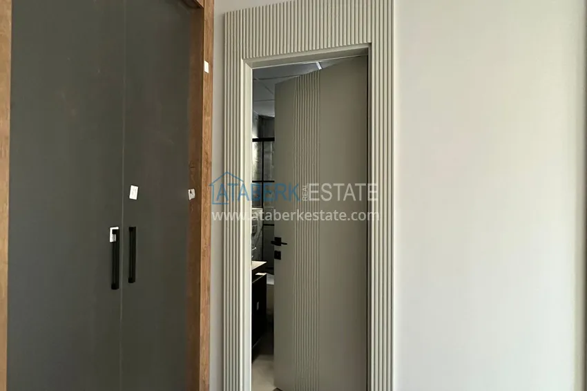 Приобрести Просторные двухкомнатные квартиры в новом комплексе в центре района Мезитли, Мерсин 5 