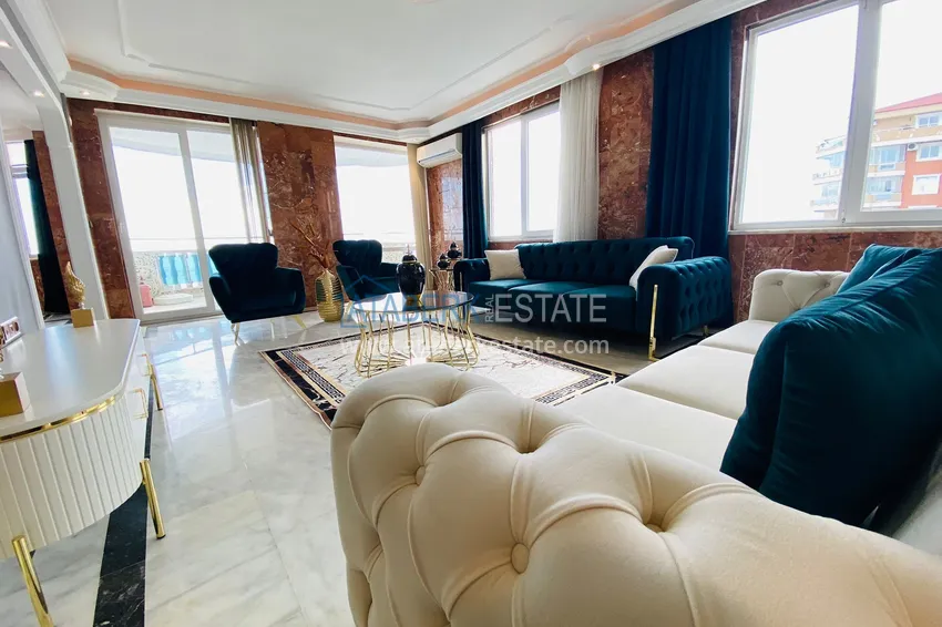 Приобрести Роскошный видовой дуплекс с дизайнерским ремонтом и новой мебелью на первой береговой в Махмутларе, Алания 8 