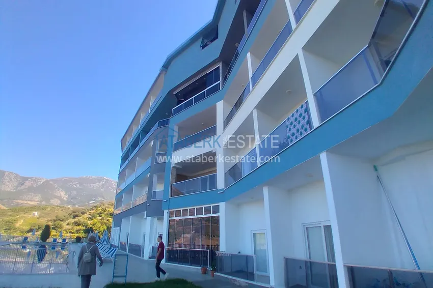 Квартира-студия с мебелью и боковым видом на море в Алании, район Каргыджак 6 