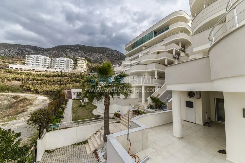 Великолепные террасные апартаменты с мебелью и видом на море в Алании, район Махмутлар 5 