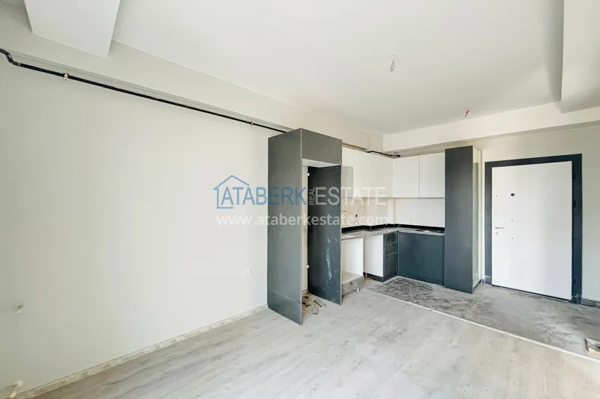 Приобрести Двухкомнатная квартира с застекленным балконом! Новостройки в Мерсине, район Мезитли 5 