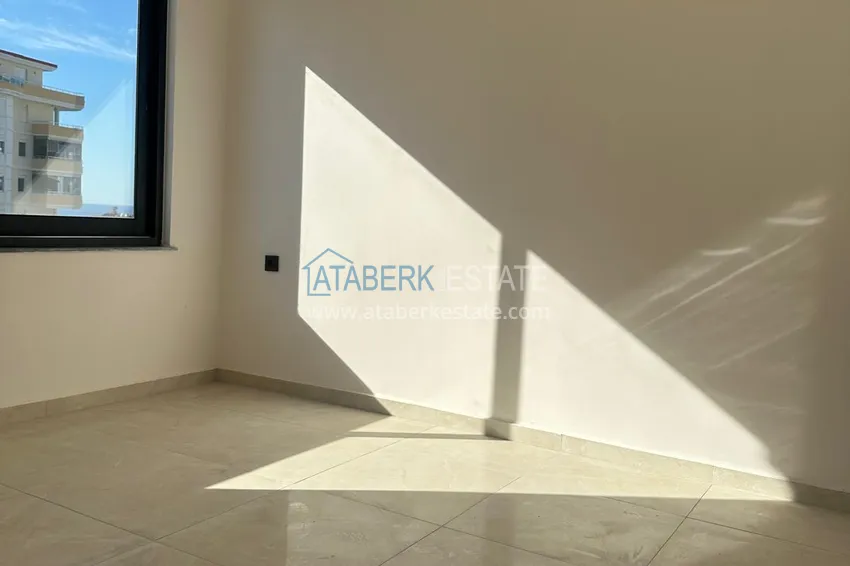 Приобрести Двухкомнатные квартиры с чистовой отделкой в Алании, район Махмутлар 6 