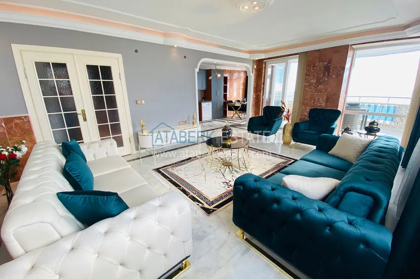 Приобрести Роскошный видовой дуплекс с дизайнерским ремонтом и новой мебелью на первой береговой в Махмутларе, Алания 9 