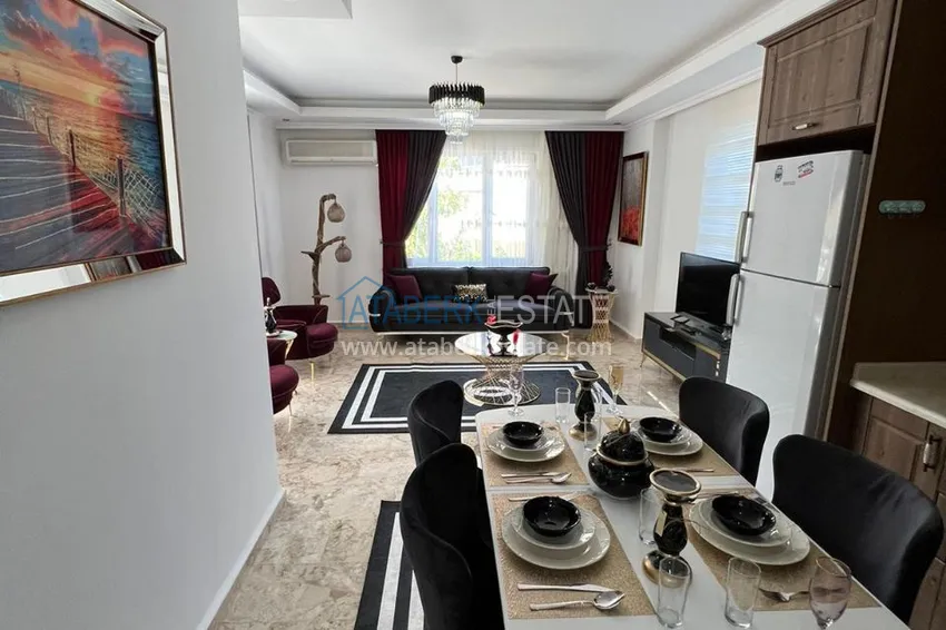 Приобрести Трехкомнатная квартира с мебелью в Алании, район Махмутлар 7 