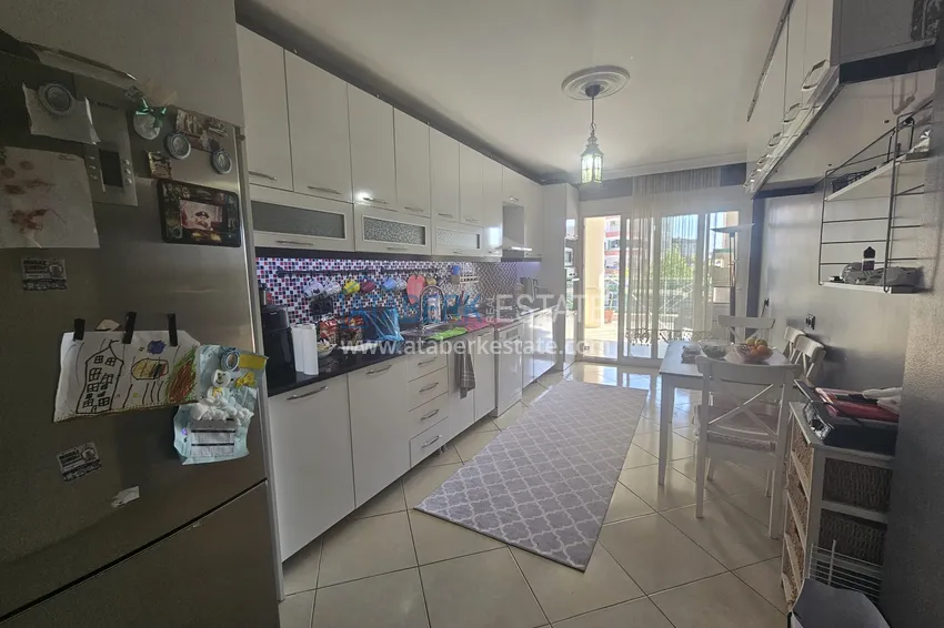 Приобрести Линейная четырехкомнатная квартира с отдельной кухней в районе Джикджилли, Алания 6 