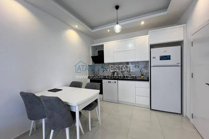 Приобрести Двухкомнатная квартира с частичным видом на море – Каргыджак, Алания, 100 метров от моря 7