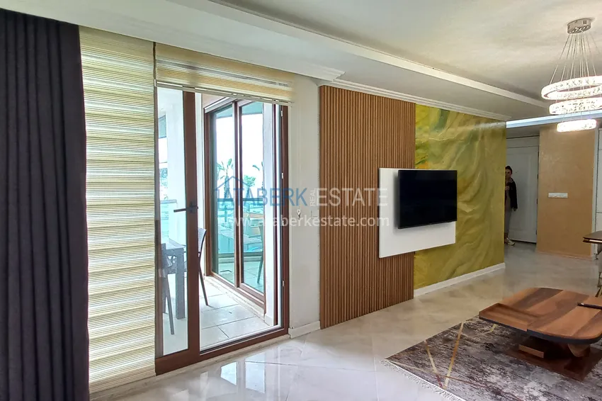 Приобрести Стильная квартира с видом на море в комплексе на первой береговой – район Оба, Алания 9 