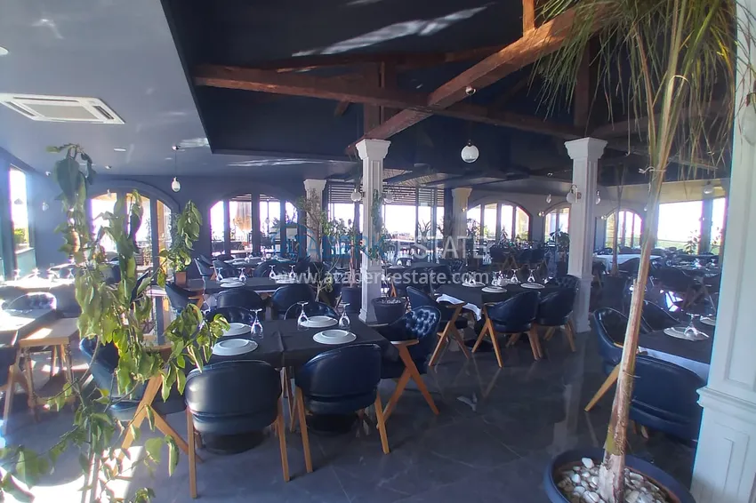 Квартира-студия с мебелью и боковым видом на море в Алании, район Каргыджак 9 