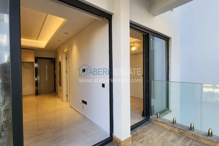 Приобрести Квартира с чистовой отделкой на первой береговой линии - Алания, район Махмутлар 9 