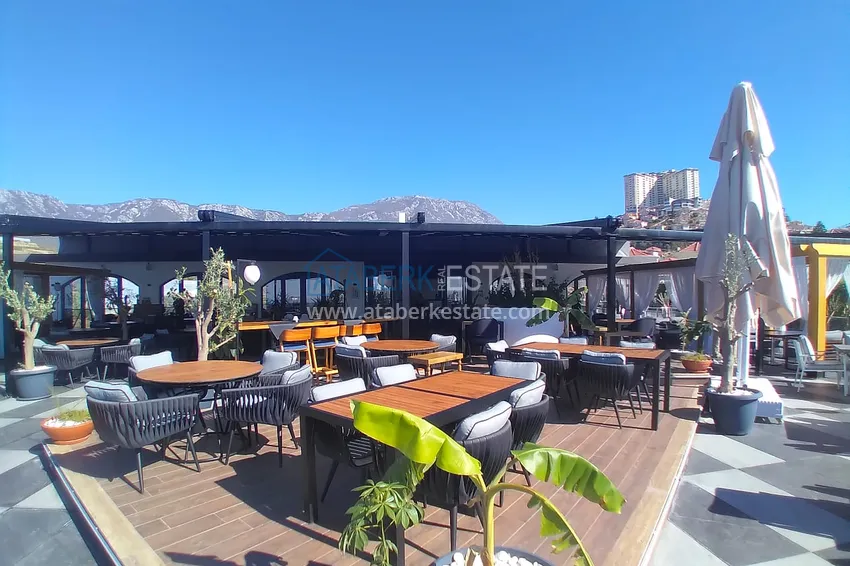 Квартира-студия с мебелью и боковым видом на море в Алании, район Каргыджак 10 