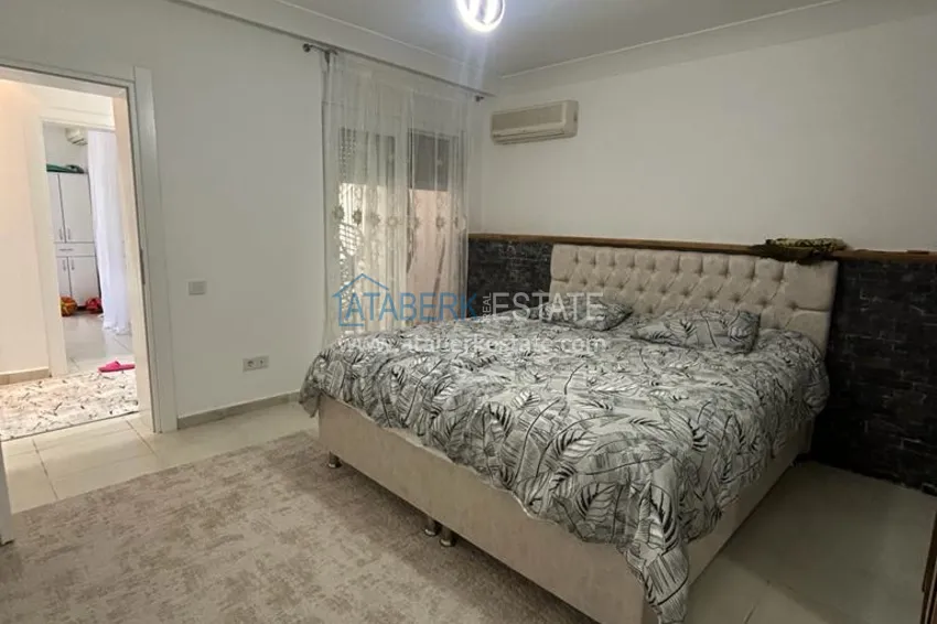 Приобрести Великолепные террасные апартаменты с мебелью и видом на море в Алании, район Махмутлар 9 