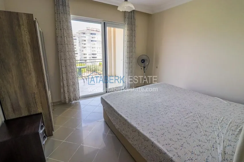 Приобрести Трехкомнатная квартира с мебелью и видом на море в Алании, район Тосмур 8 