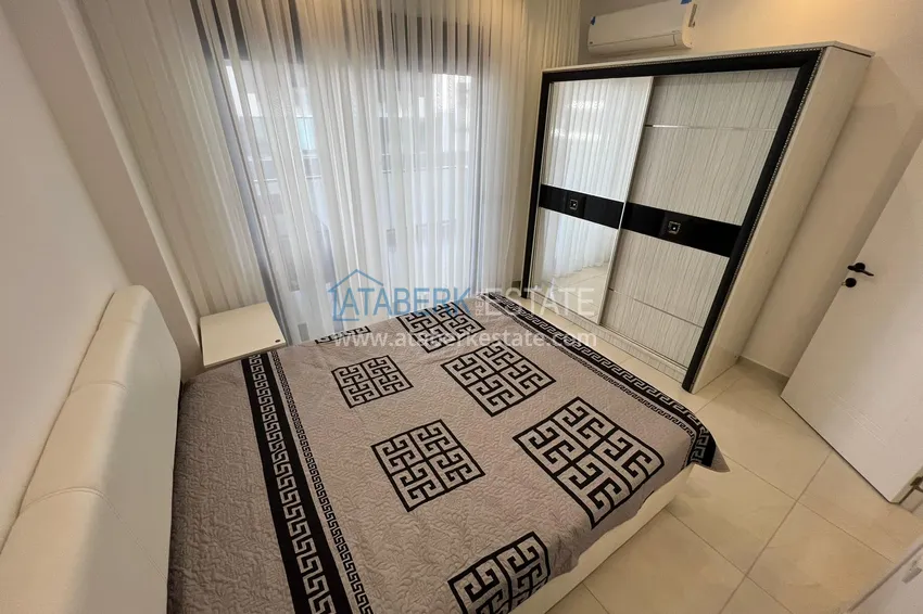 Приобрести Двухкомнатная квартира с частичным видом на море – Каргыджак, Алания, 100 метров от моря 9