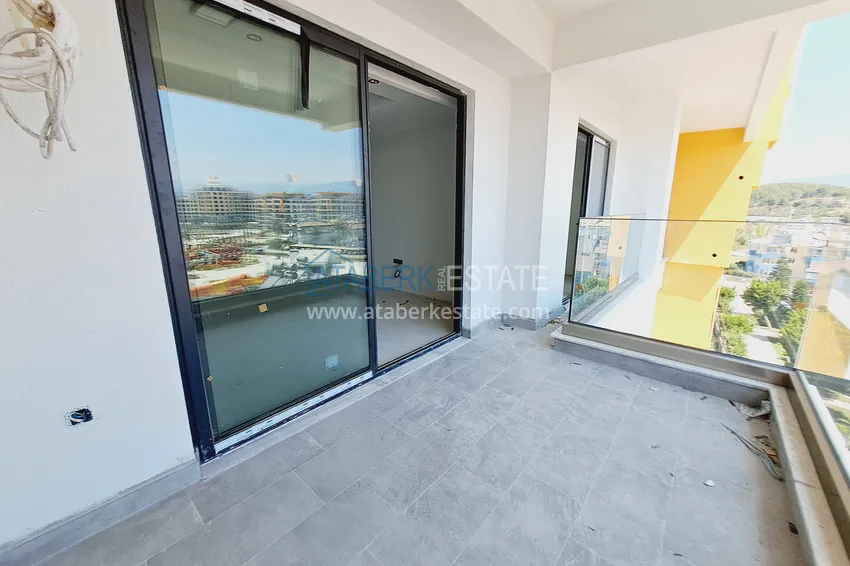 Приобрести Квартира у моря в пятизвёздочном комплекс-отеле - Алания, район Тюрклер 9 