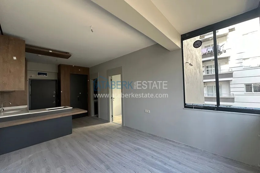 Приобрести Просторные двухкомнатные квартиры в новом комплексе в центре района Мезитли, Мерсин 10 