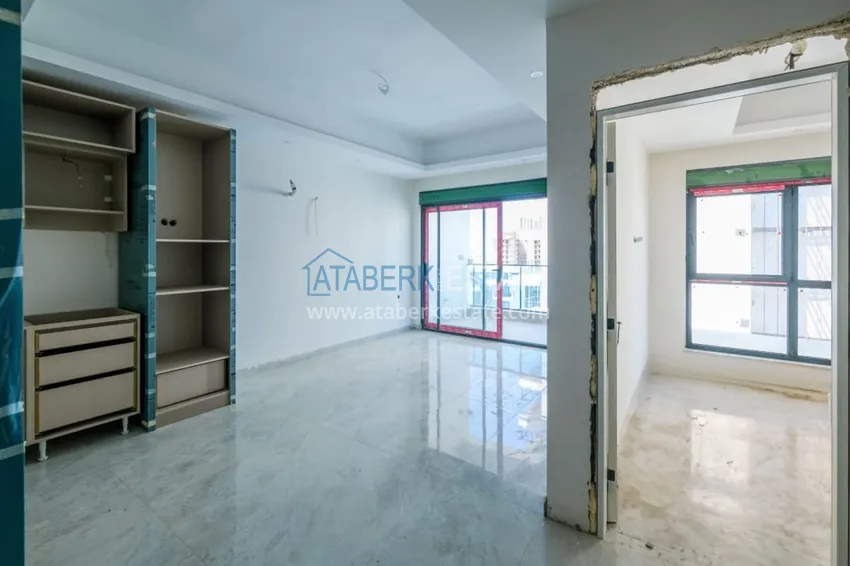 Приобрести Современная двухкомнатная квартира с чистовой отделкой в районе Махмутлар, Алания 1 