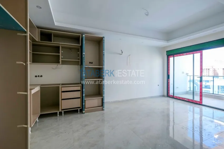 Приобрести Современная двухкомнатная квартира с чистовой отделкой в районе Махмутлар, Алания 2 