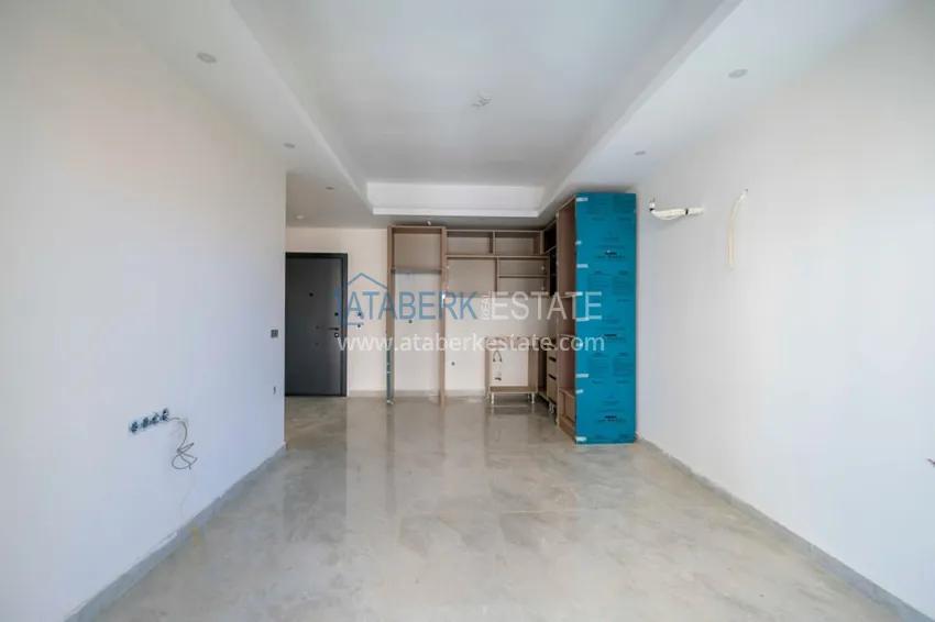 Приобрести Современная двухкомнатная квартира с чистовой отделкой в районе Махмутлар, Алания 4 