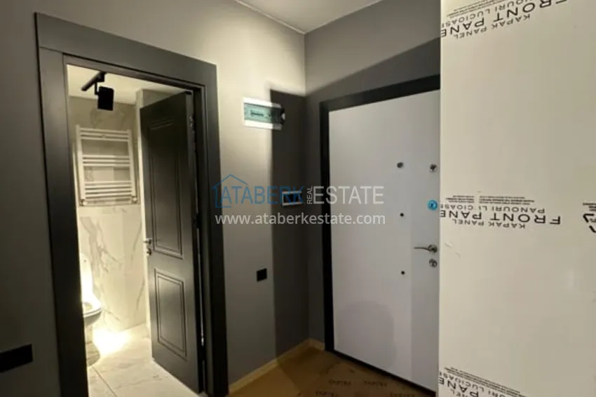 Приобрести Двухкомнатный пентхаус с частичным видом на море в Мерсине, Тедже 1 