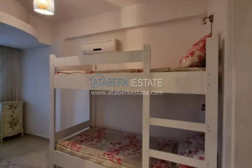 Приобрести Трёхкомнатные апартаменты с мебелью и видом на море, район Махмутлар – Алания 12