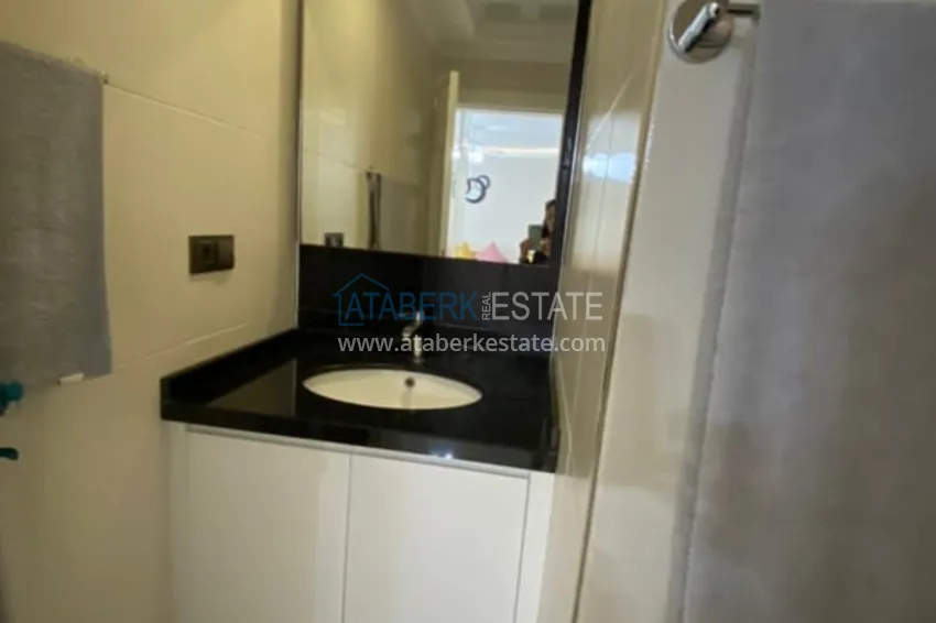 Приобрести Меблированная квартира 1+1 с видом на море в элитном комплексе, район Каргыджак – Алания 10