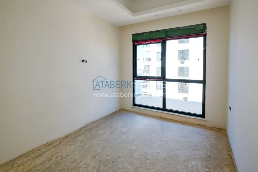 Приобрести Современная двухкомнатная квартира с чистовой отделкой в районе Махмутлар, Алания 5 