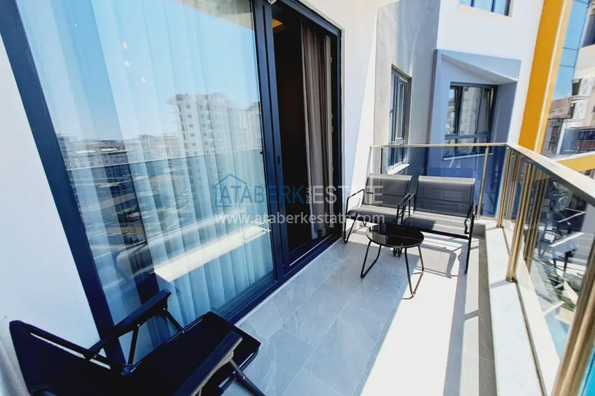 Приобрести Квартира 1+1 с мебелью и частичным видом на море, район Махмутлар – Алания 13 