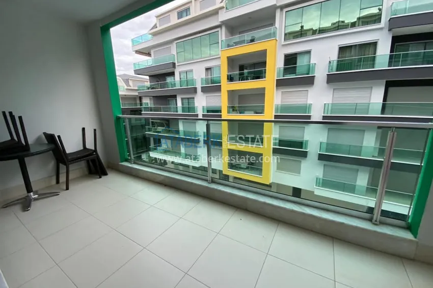 Приобрести Меблированная квартира 1+1 с видом на море в элитном комплексе, район Каргыджак – Алания 11