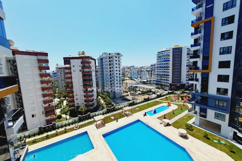 Приобрести Квартира 1+1 с мебелью и частичным видом на море, район Махмутлар – Алания 14 