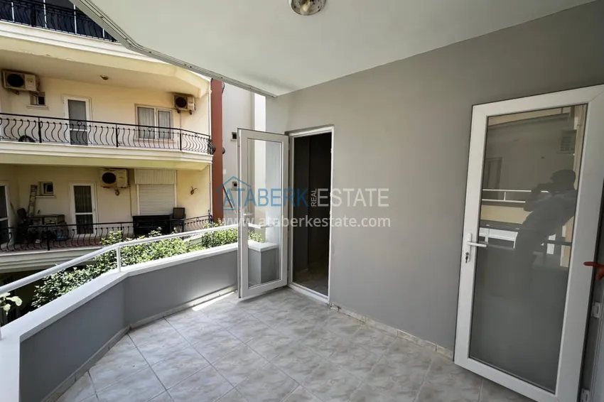 Приобрести Недвижимость под ВНЖ. Трехкомнатная квартира с отдельной кухней в Алании, район Тосмур 12 