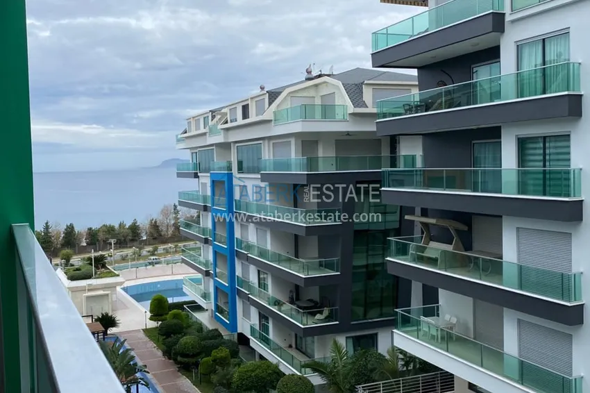 Приобрести Меблированная квартира 1+1 с видом на море в элитном комплексе, район Каргыджак – Алания 13