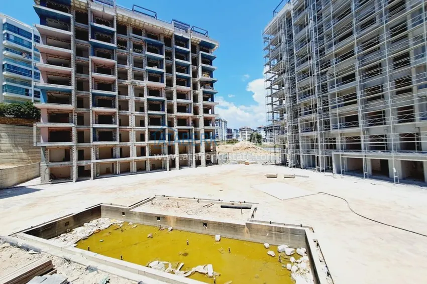 Фото -  Квартира с 2 спальнями в комплексе на этапе строительства в Авсалларе, Алания 13 