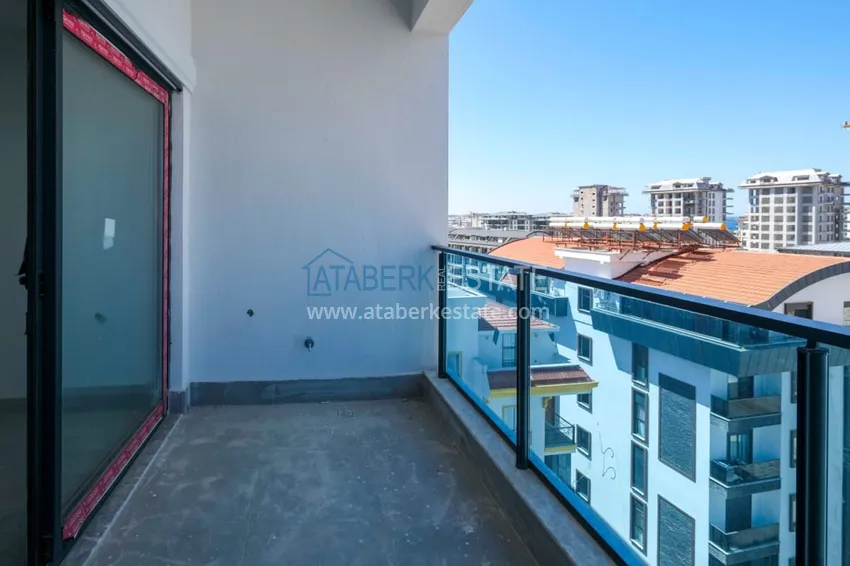 Приобрести Современная двухкомнатная квартира с чистовой отделкой в районе Махмутлар, Алания 9 