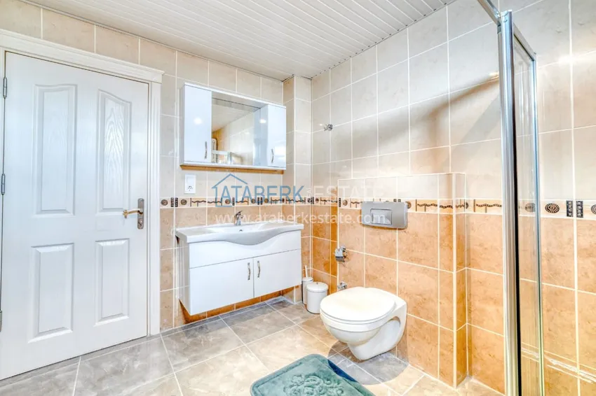 Приобрести Квартира под ключ с открытым видом на море в комплексе на первой береговой - район Тосмур, Алания 16 