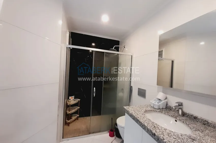 Приобрести Квартира 1+1 с мебелью и видом на море в комплексе на первой береговой – Алания, район Каргыджак 14 