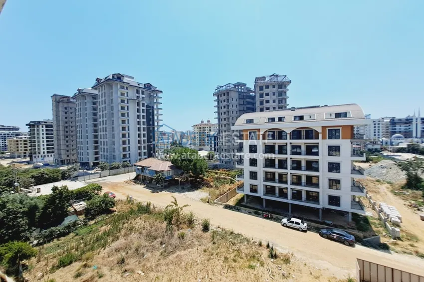 Приобрести Дуплексы 2+1 с полной чистовой отделкой в новостройке – Алания, район Махмутлар 17 