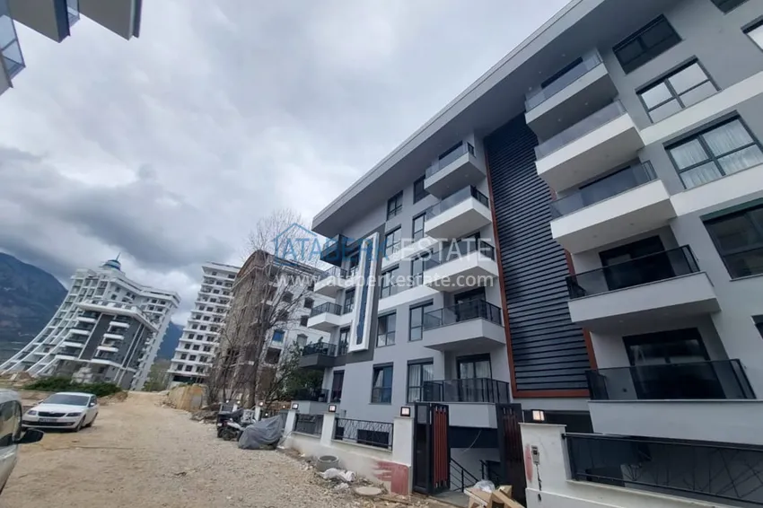 Дуплексы 2+1 с полной чистовой отделкой в новостройке – Алания, район Махмутлар 1 