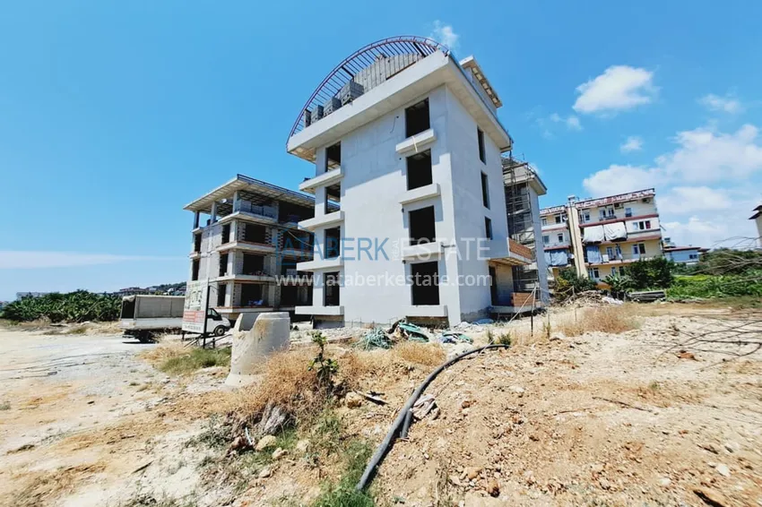 Фото - Недорогие квартиры от застройщика в Алании район Окурджалар на этапе проекта 1 