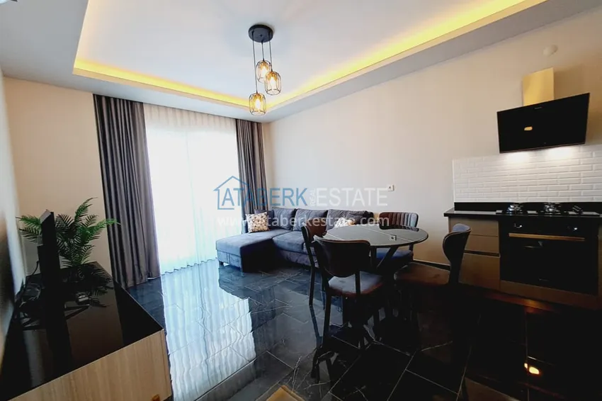 Приобрести Квартира 1+1 с мебелью и частичным видом на море, район Махмутлар – Алания 2 