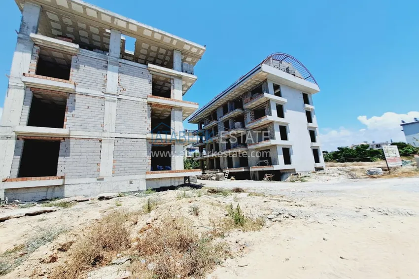 Фото - Недорогие квартиры от застройщика в Алании район Окурджалар на этапе проекта 2 