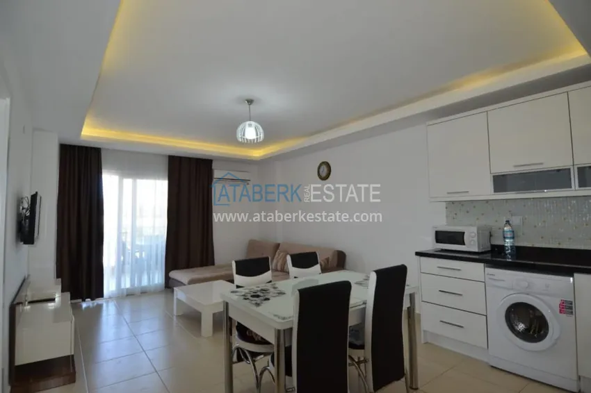 Приобрести Двухкомнатная квартира под ключ в комплексе с концепцией отеля – Алания, район Авсаллар 2 