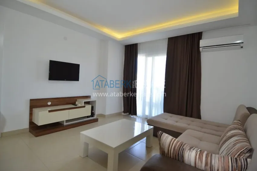 Приобрести Двухкомнатная квартира под ключ в комплексе с концепцией отеля – Алания, район Авсаллар 3 