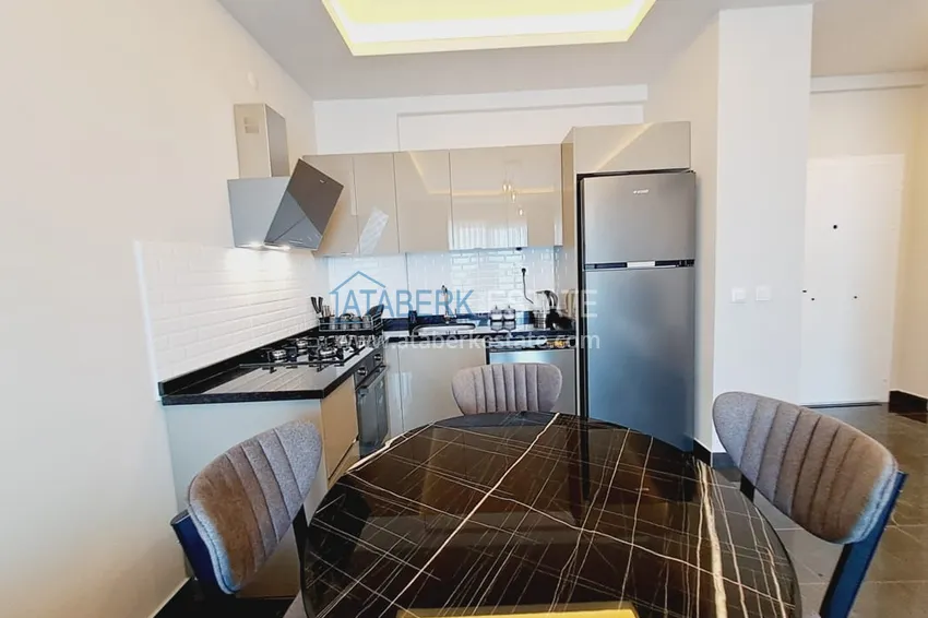 Приобрести Квартира 1+1 с мебелью и частичным видом на море, район Махмутлар – Алания 6 