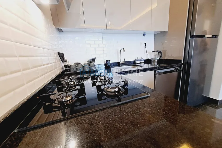 Приобрести Квартира 1+1 с мебелью и частичным видом на море, район Махмутлар – Алания 7 